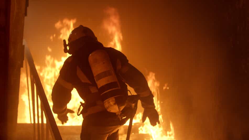 Firefighter Running Up Stairs